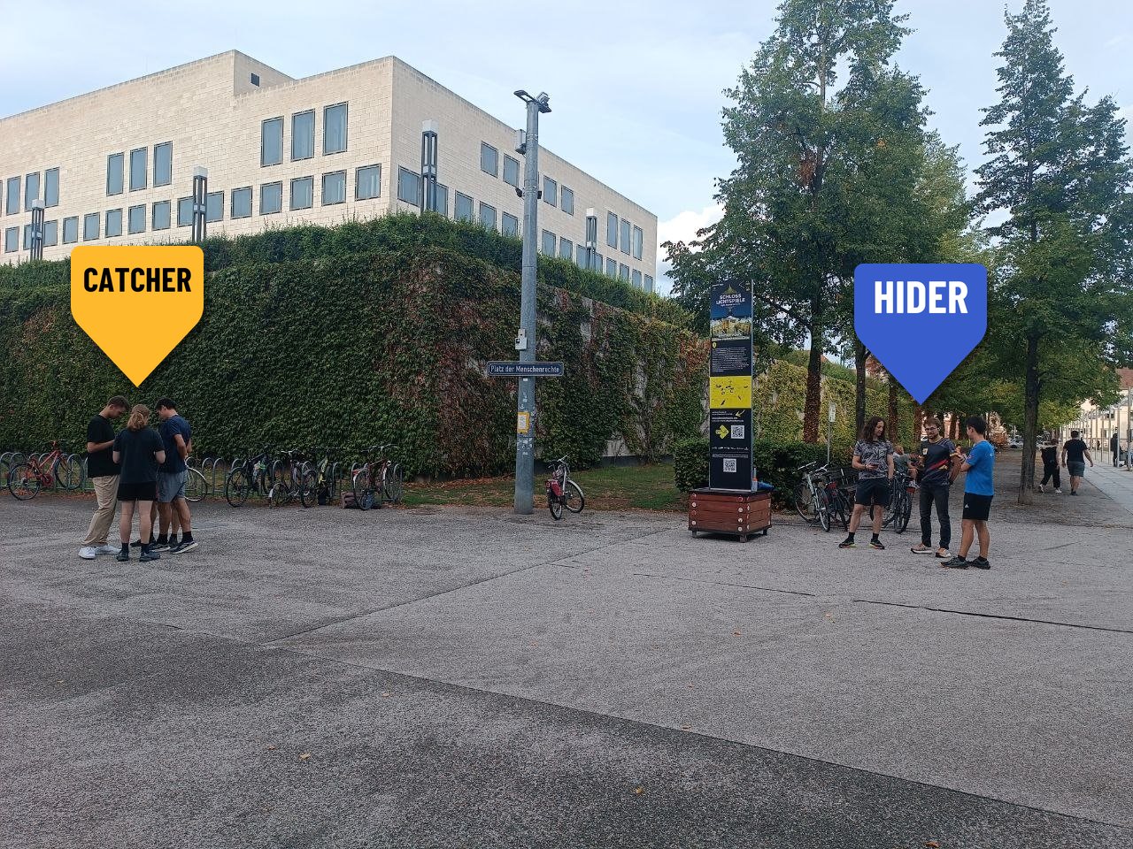 Two teams on the street: Catchers and Hiders, marked with their pins